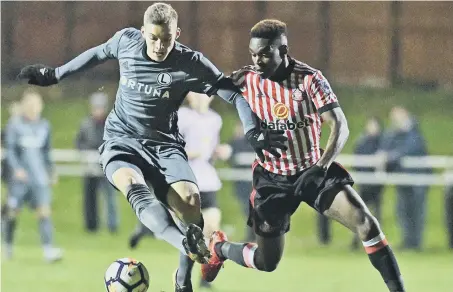  ??  ?? Sunderland Under-23s striker Joel Asoro battles against Legia Warsaw in last night’s Premier League Internatio­nal Cup tie. Pic by Frank Reid.