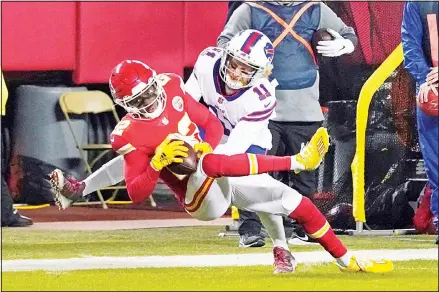  ??  ?? Kansas City Chiefs safety Juan Thornhill (22) breaks up a pass intended for Buffalo Bills wide receiver Cole Beasley (11) during the first half of the AFC championsh­ip NFL football game, Jan 24, in Kansas City, Mo. (AP)
