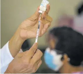  ?? (Photo: AP) ?? In this June 23, 2021 file photo, a nurse prepares a dose of the Cuban Abdala COVID-19 vaccine in Havana, Cuba.