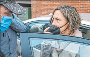  ?? Andrew Rush Tribune News Service ?? Accused Capitol rioter Rachel Powell after being released from Butler County Prison on Feb. 12, 2021, in Butler, Ohio. Powell is accused of smashing a U.S. Capitol window with a pipe and exhorting rioters to breach the building.