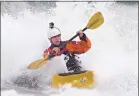  ?? JOHN GREEN/STAFF ?? Erik Esquerra, with a GoPro on his helmet, rides a surf kayak at Pacifica State Beach.