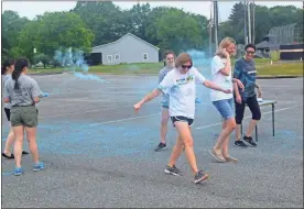  ?? / Sean Williams ?? Runners who crossed the finish line were showered with colored powder during the FBLA Color Run 2018, a fundraiser held for the March of Dimes.