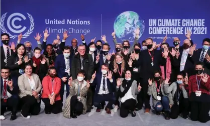  ?? Photograph: Yves Herman/Reuters ?? Delegates pose for a photo at the end of the Cop26 climate conference.
