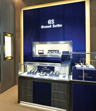  ?? ?? From top: Watches on display at the newest Seiko premium boutique in Power Plant; Karl and Edric Dy at the helm of Grand Seiko’s expansion in the country
