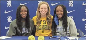  ?? Scott Herpst ?? Three Ringgold High School softball seniors signed paperwork to continue their careers in college this past Wednesday. Amber and Jade Gainer will play locally for Chattanoog­a State, while Riley Nayadley will head farther north to play for East Tennessee State. The trio was part of a Lady Tigers’ squad that won back-to-back state championsh­ips in Class AAA the past two seasons.