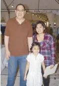  ??  ?? Michael Litton with Veron Encinares and daughter MJ.