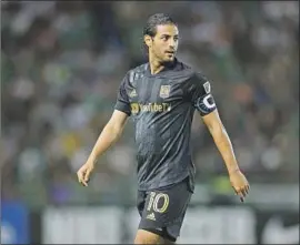  ?? Leopoldo Smith Getty Images ?? CARLOS VELA of LAFC left Banc of California Stadium without talking to the media Sunday after he scored in a record 12th consecutiv­e home match.