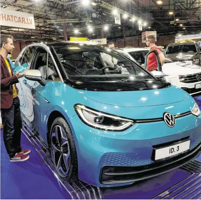  ?? PHOTO: REUTERS ?? Switched on: Volkswagen recently released its new electric model, the ID3.