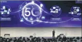  ?? ZHU XINGXIN / CHINA DAILY ?? A representa­tive of Qualcomm Inc explains 5G technology to the conference audience on Wednesday.