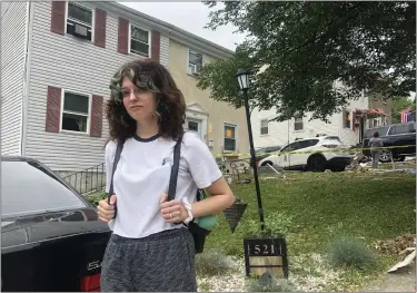  ?? RACHEL RAVINA — MEDIANEWS GROUP ?? Rebecca Scott, 22, of Pottstown, recounts her experience living on Butler Street Friday afternoon, near the site of a nearby house explosion in Pottstown.