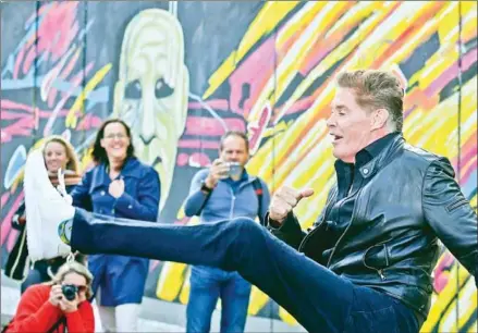  ??  ?? US actor and singer David Hasselhoff (‘ poses during an event to promote his new audiobook titled September 17 at the East Side Gallery, a remnant of the Berlin Wall, in Berlin. on