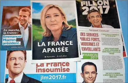  ??  ?? Affiches, clips, équité du temps de parole : la campagne entre dans sa dernière ligne droite, à 13 jours du 1er tour.