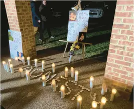  ?? SIAN WILKERSON/STAFF ?? Candles spell out the name of Williamsbu­rg teen Aonesty Selby, who was found dead Jan. 13 in a remote part of Isle of Wight County.