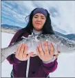  ?? COURTESY PHOTO ?? Aundrea Rascón, 14, of Taos caught a 23-inch rainbow trout using a silver Kastmaster at Eagle Nest Lake.