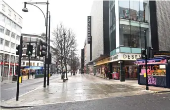  ?? — AFP photo ?? A view of an empty Oxford Street is pictured as Britain enters a national lockdown in London.