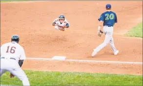  ?? J. Kelley Dentry / Submitted ?? Willy Yahn dives head- first into third base during a game for the Aberdeen Ironbirds