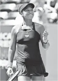  ?? DANIELLE PARHIZKARA­N/USA TODAY SPORTS ?? Naomi Osaka of Japan celebrates her straight-set win against unseeded Lesia Tsurenko of Ukraine.