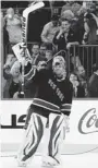  ?? KATHY WILLENS/ THE ASSOCIATED PRESS ?? Rangers goalie Henrik Lundqvist celebrates a 3-2 shootout win over the Maple Leafs.
