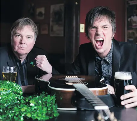  ?? DAX MELMER ?? Kevin Shannon, left, and Ted Lamont of the band Paddy Whacked have a pintThursd­ay at O’Maggio’s Kildare House, where they will be performing Saturday. “If I didn’t show up on St. Patrick’s Day, people might think I’m dead,” said Shannon of his 30-year...