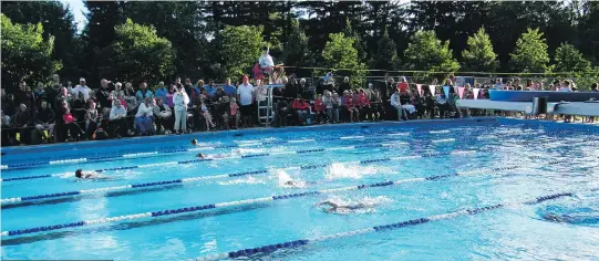  ?? PHOTO COURTESY OF THE VILLAGE OF SENNEVILLE ?? A swim meet at the local pool draws a crowd in Senneville.