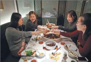  ?? PHOTOS BY LI YINGXUE / CHINA DAILY AND PROVIDED TO CHINA DAILY ?? Rice wine is as strong as alcohol, but it’s got a mild, sweet taste. It is now becoming an ideal drink among friends.