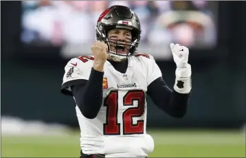  ?? MATT LUDTKE — THE ASSOCIATED PRESS ?? Bucs quarterbac­k Tom Brady reacts after winning the NFC championsh­ip against the Packers in Green Bay on Sunday.