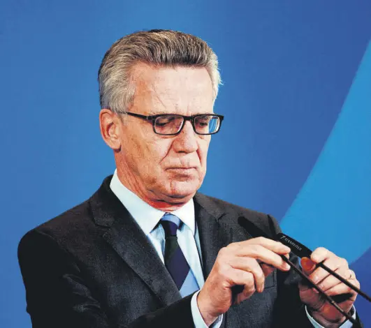  ??  ?? German Interior Minister Thomas de Maiziere speaks during a press conference in Berlin about the deportatio­n measures to Afghanista­n, Sept. 13.