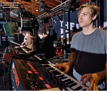  ??  ?? The band warm up the synths for an on stage soundcheck in Bristol