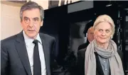  ?? AFP ?? Former French presidenti­al election candidate Francois Fillon is seen with his wife Penelope Fillon.