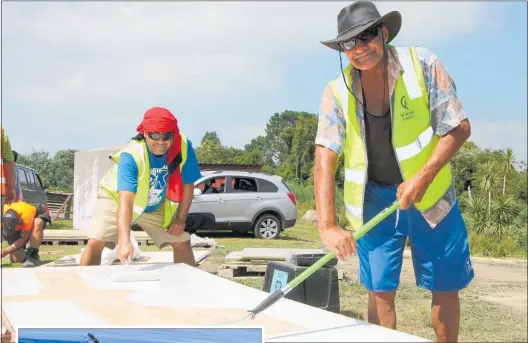  ??  ?? Te Huakiwi Dinsdale, left, and Bari Taiatini lending a hand at the filming of Marae DIY at Makahae Marae in Te Puke.