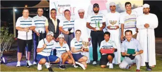  ?? – Supplied photo ?? PROUD WINNERS: The winners of the Assarain Golf Classic pose with their trophies along with the managing director and tournament officials.