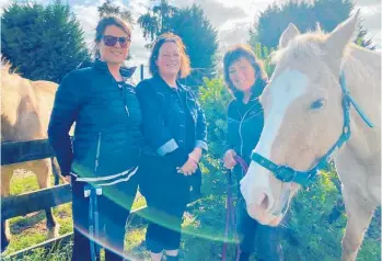  ?? ?? Karen Turner’s life was turned around with the help of Jules (left) from Here Toitu¯ and some equine therapy with Renee Keenan (right) from Changing Horses Ltd.