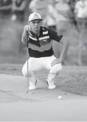  ?? MIKE EHRMANN/GETTY IMAGES ?? Rickie Fowler assesses a putt on the sixth green during the third round of the Honda Classic at PGA National.