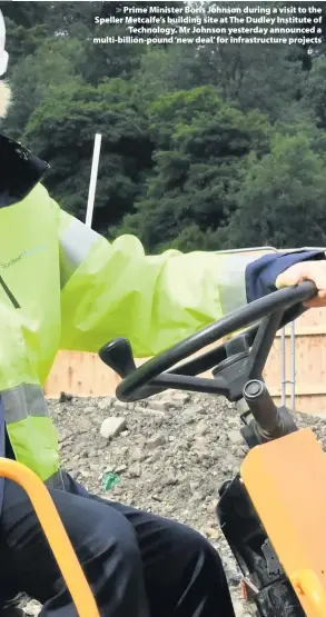  ??  ?? > Prime Minister Boris Johnson during a visit to the Speller Metcalfe’s building site at The Dudley Institute of Technology. Mr Johnson yesterday announced a multi-billion-pound ‘new deal’ for infrastruc­ture projects