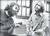  ?? Peter Simon ?? JERRY GARCIA, left, and Bob Weir in the Grateful Dead documentar­y “Long Strange Trip.”