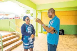  ?? CONTRIBUTE­D PHOTOS ?? Guidance Counsellor Sashalee Grant (left) chats with D&G Foundation Accountant Dennis Beckford (right) about the major takeaways of the workshop held in Manchester. The D&G Foundation and RISE Life Management Services hosted the latest ‘Pon Anodda Level’ guidance counsellor­s’ workshop in Manchester.