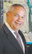  ??  ?? Mayor Tom Tate has visions of a Central Park-type area.