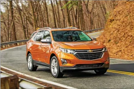  ??  ?? The all-new 2018 Chevrolet Equinox is a fresh and modern SUV sized and designed to meet the needs of the compact SUV customer. Its expressive exterior has an all-new, athletic look echoing the global Chevrolet design cues seen on vehicles such as the...