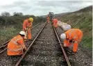  ??  ?? A West Somerset Railway track gang in action. WSRA