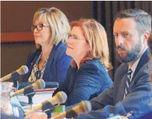  ?? JIM THOMPSON/ALBUQUERQU­E JOURNAL ?? University of New Mexico President Garnett S. Stokes sits with the members of the Board of Regents during an April meeting in the UNM Student Union during which speakers urged the board not to eliminate sports.