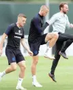  ?? — Reuters ?? England’s Jamie Vardy, Eric Dier and England manager Gareth Southgate during training.