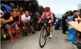  ?? Photograph: Tim de Waele/Getty Images ?? Remco Evenepoel is cheered on by spectators on Sunday’s final ascent at Les Praeres.