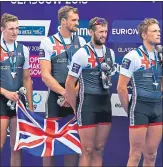  ??  ?? Great Britan’s James Johnston, Adam Neil, Jacob Dawson and Thomas Ford on the podium after winning silver in the rowing.