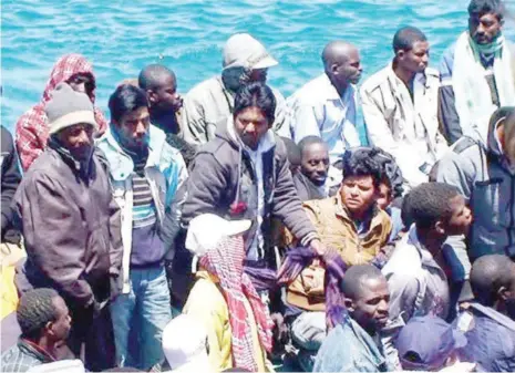 ??  ?? Immigrants struggling to go to Europe