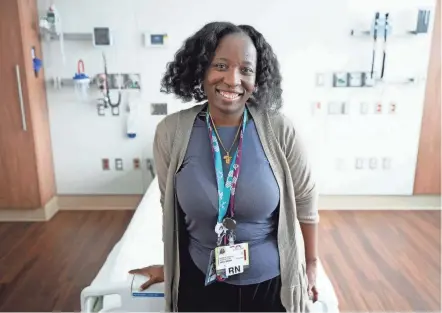  ?? BARBARA J. PERENIC/COLUMBUS DISPATCH ?? Mount Carmel Grove City Nurse Manager Jatu Boikai is the only Black nurse manager of maternity services in Ohio. She’s working to diversify the nursing industry by hiring more Black nurses and technician­s.