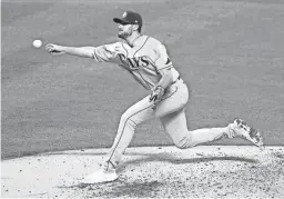  ?? FRANK FRANKLIN II/AP ?? Rays reliever Ryan Thompson delivers a pitch during the second inning of a game against the Mets on Monday in New York.