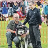  ??  ?? It was tense for these contenders waiting for their chance in the dog show.