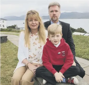  ??  ?? 0 Kathryn Brain, with her husband and son, won battle to remain in Scotland two years ago