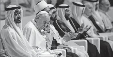  ?? [ANDREW MEDICHINI/THE ASSOCIATED PRESS] ?? Pope Francis attends a meeting of religious leaders in Abu Dhabi, United Arab Emirates, on Monday. His visit is the first papal trip ever to the Arabian Peninsula.