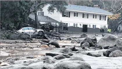  ?? AP PHOTO ?? In this photo provided by Santa Barbara County Fire Department, mud and debris flow due to heavy rain in Montecito. Calif., Tuesday.